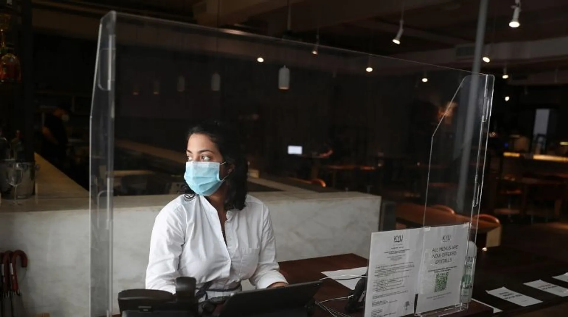 In second year of pandemic, world more stressed and sadder, poll finds