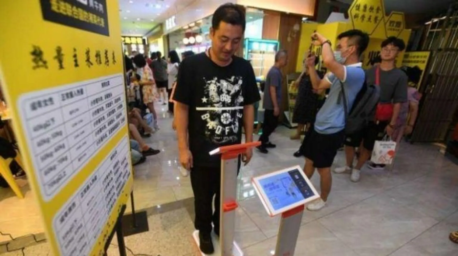 Chinese restaurant chain weighing customers to assess how much food they should eat