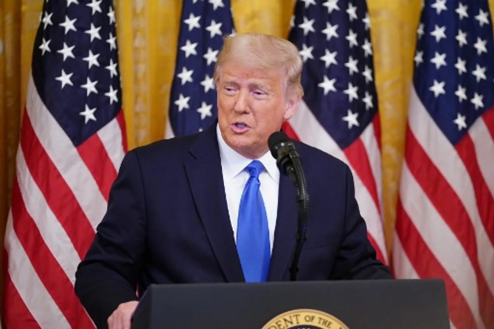 Trump tests positive for coronavirus or 'just a flu' in his own words