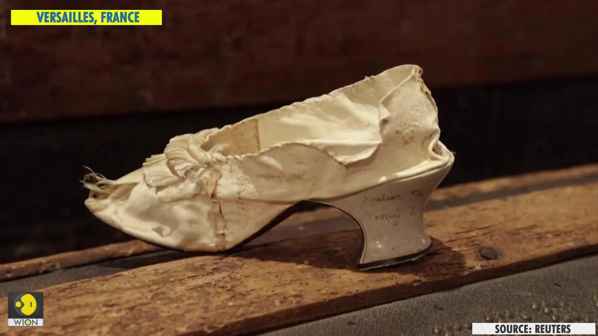 Marie Antoinette's silk shoe goes up for sale in Versailles