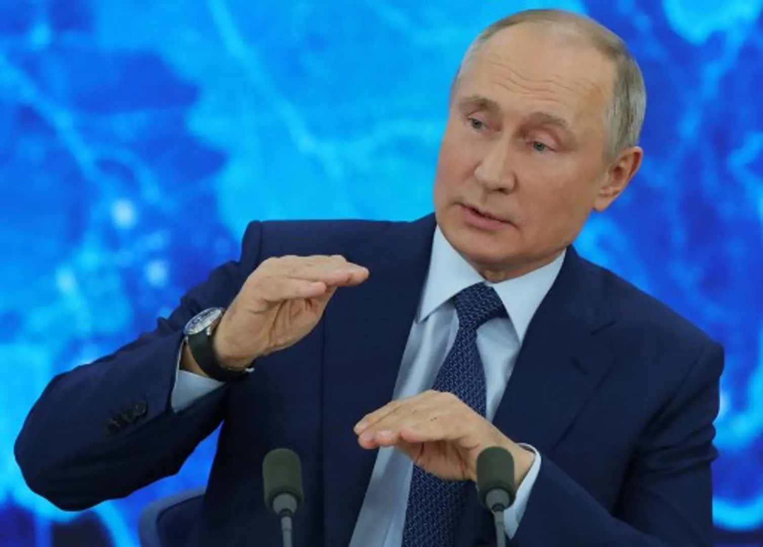 Putin says Russia fulfilling obligations to fight climate change
