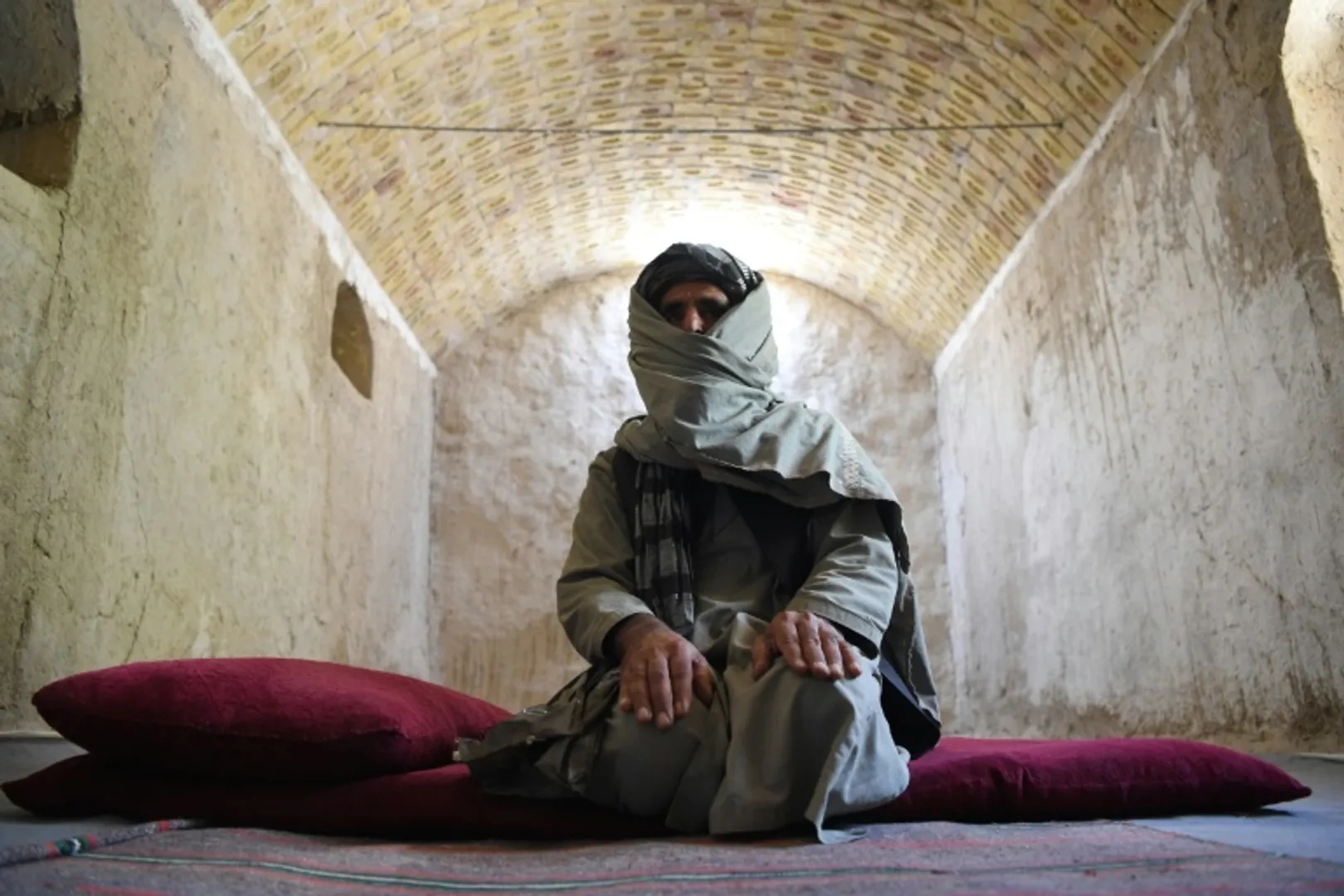 The Afghan police team welcoming back Taliban fighters