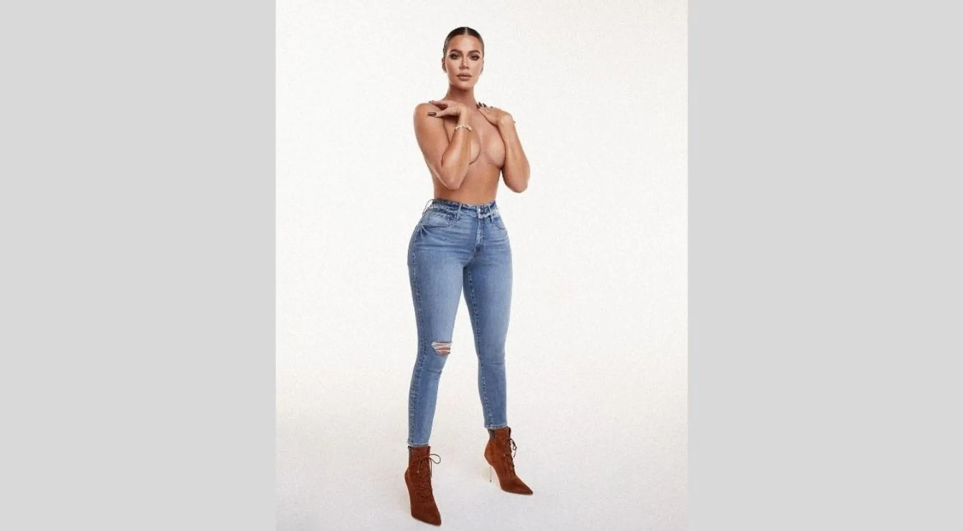 Khloe Kardashian goes topless as she reveals she's taking a break from social media