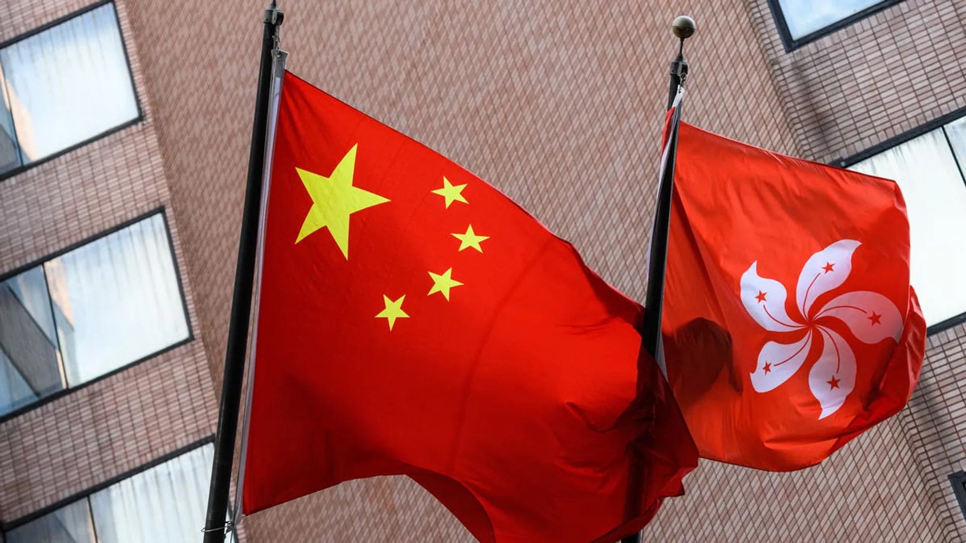 Hong Kongers plead guilty to 'national security' charge over sanction calls