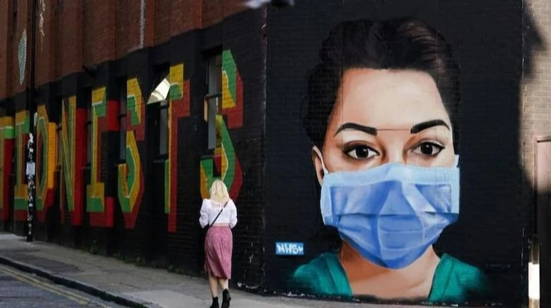 UK raises virus alert level amid surge in Omicron cases