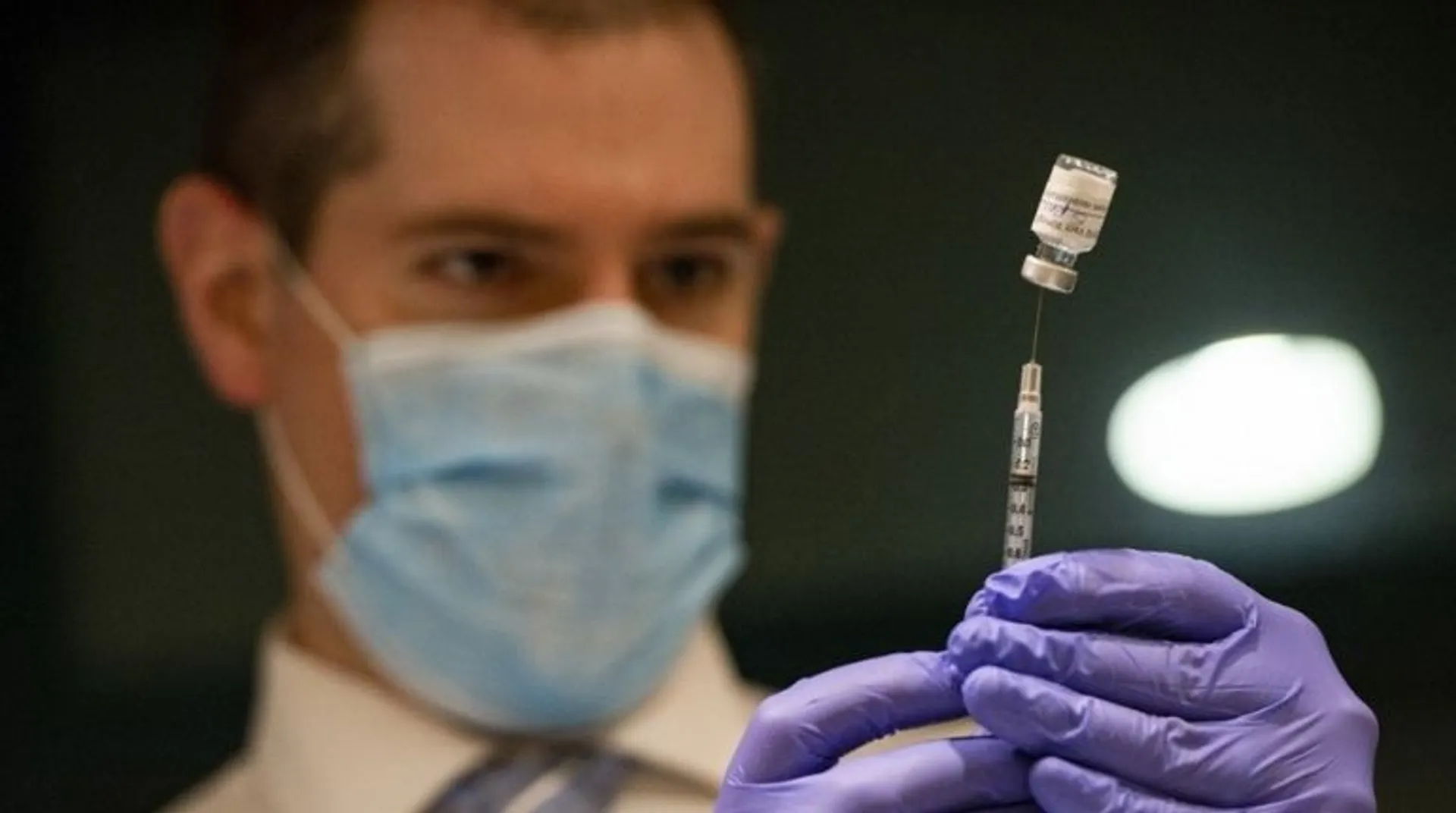 Pfizer says updated COVID-19 shots boost protection against Omicron