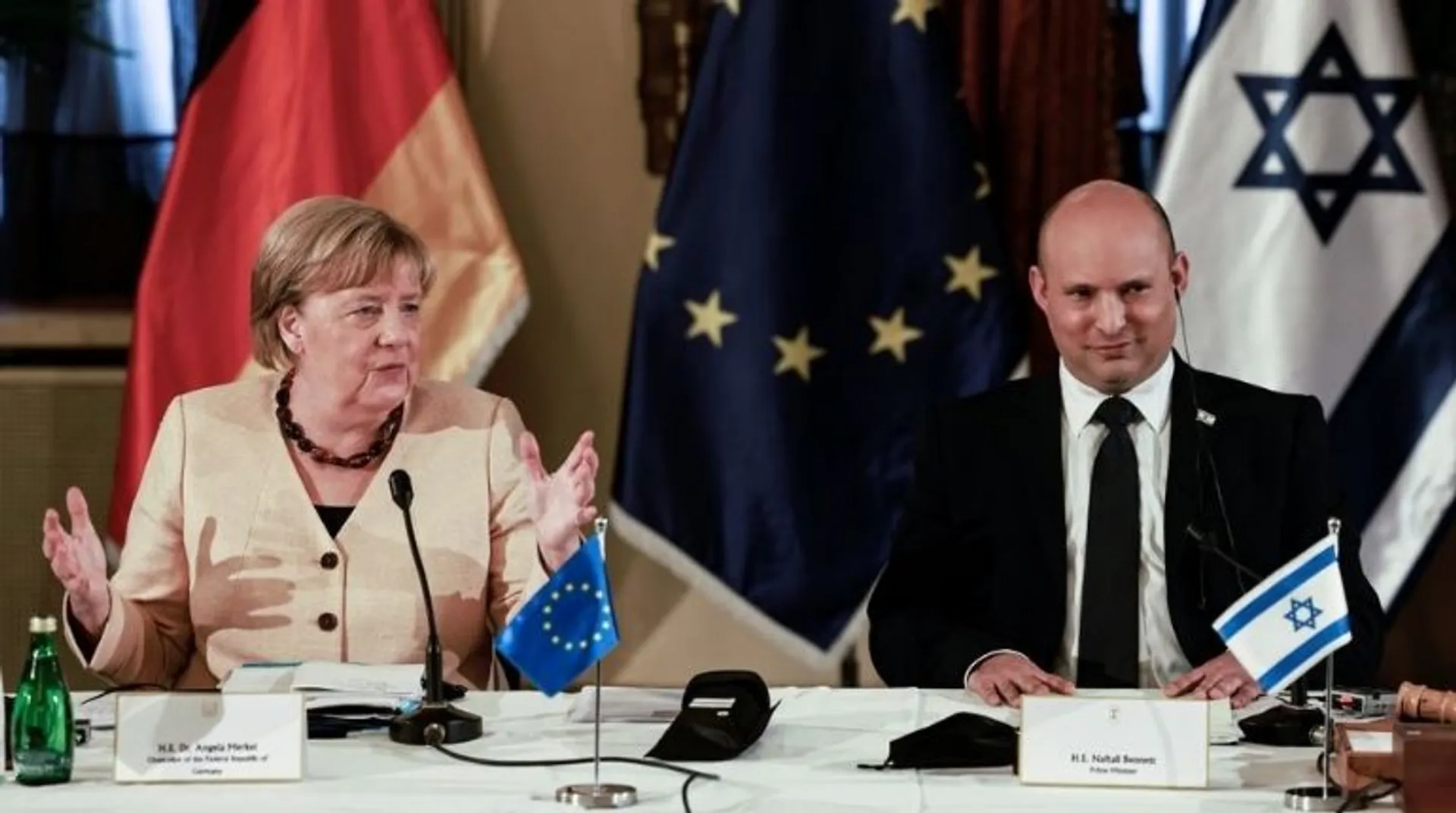 Honouring genocide victims, Merkel vows German support to Israel's security
