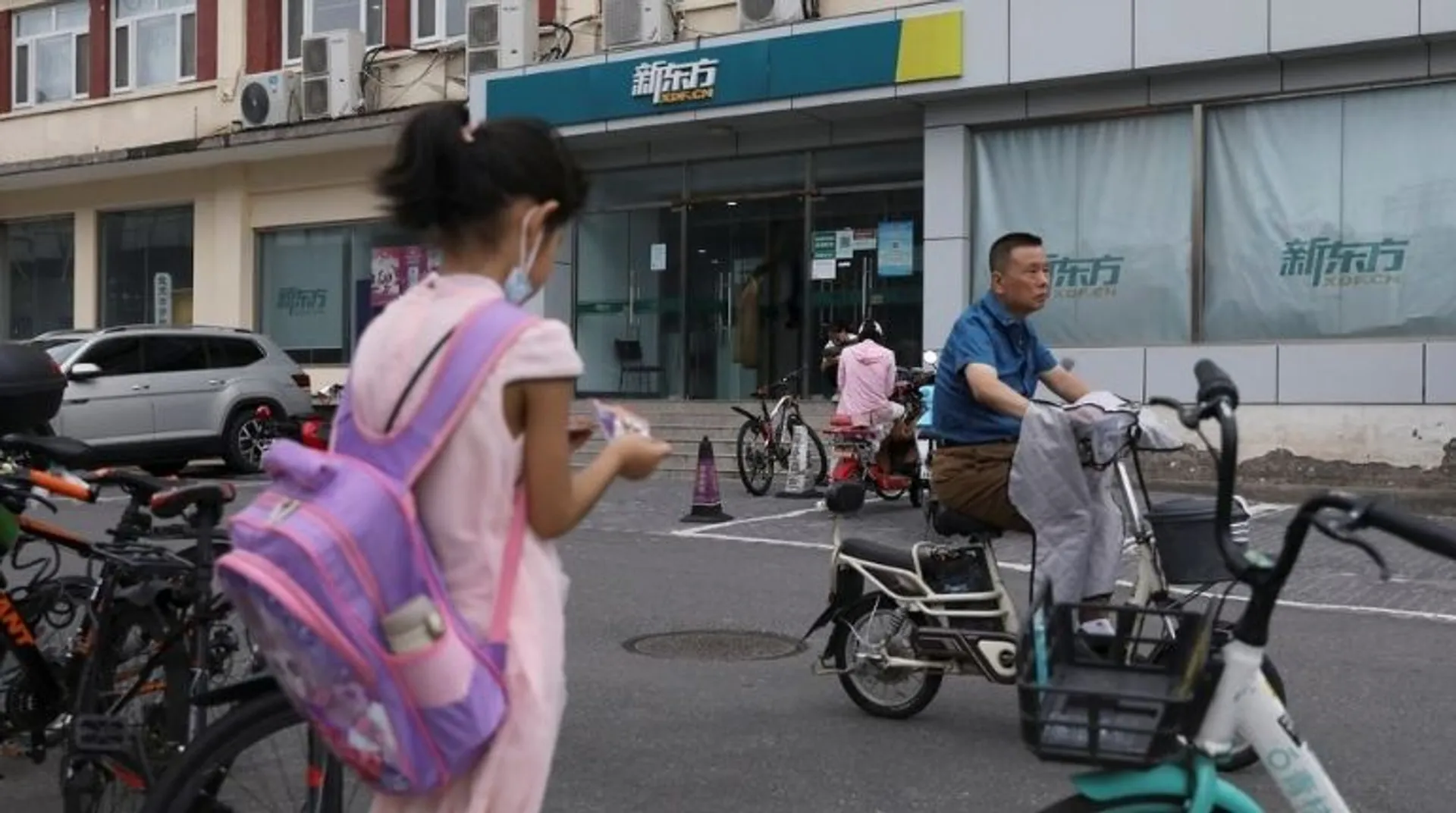Parental control? China passes law to check studentsâÂ 'twin pressures'