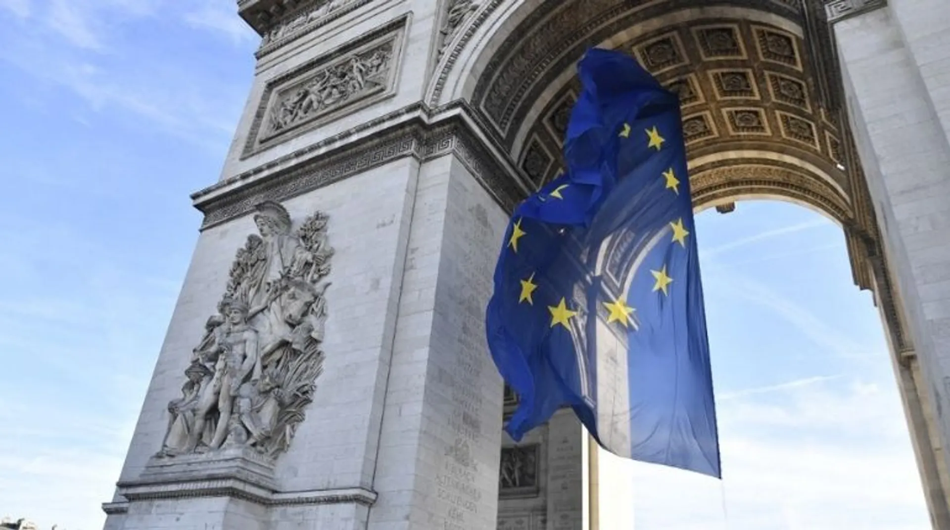 Marine Le Pen accuses French government of breaking law by hanging EU flag off Arc de Triomphe