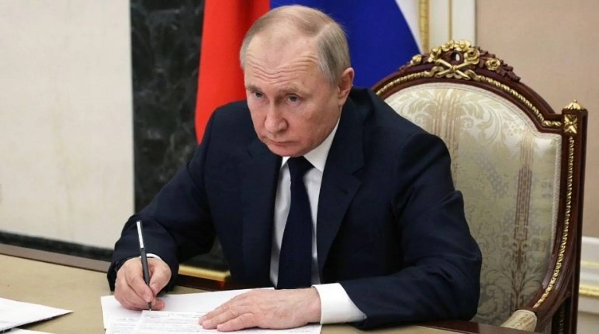 How do we deal with a superpower led by a war criminal?