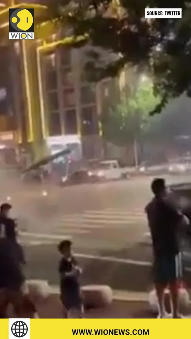 China deploys tanks to prevent depositors from reaching crisis-hit banks