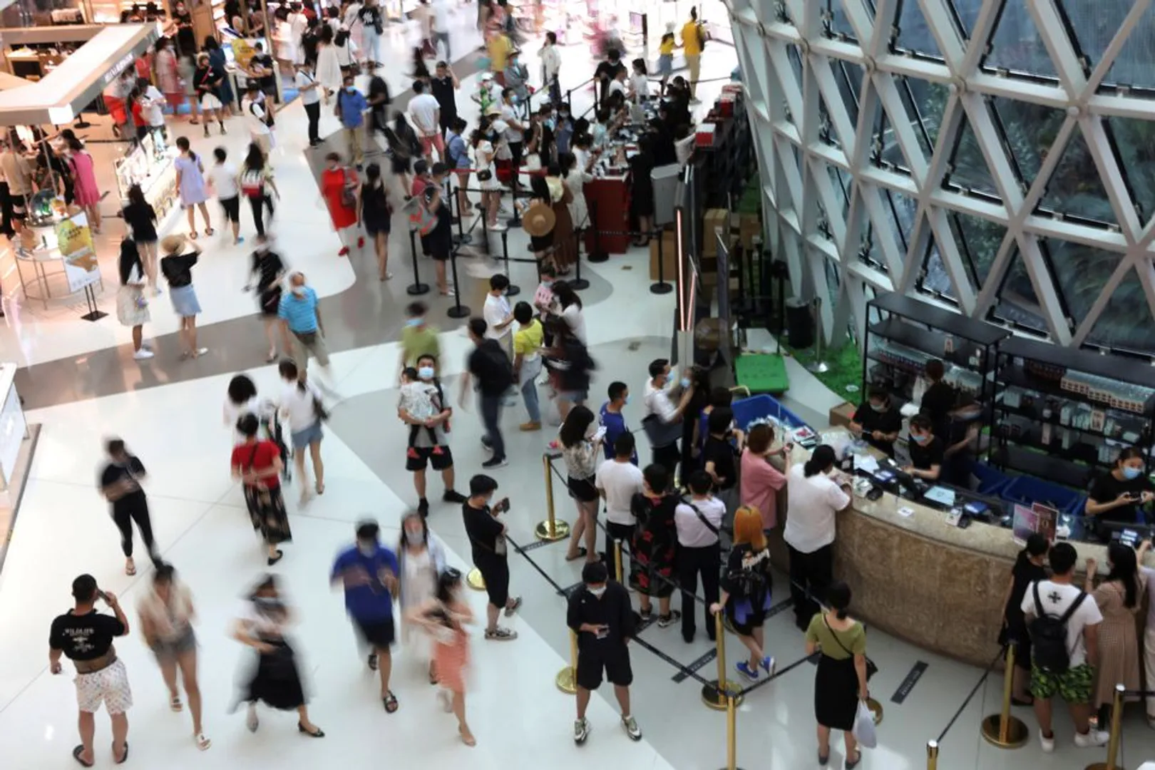 Chinese beach holiday city imposes lockdown as Covid cases spike