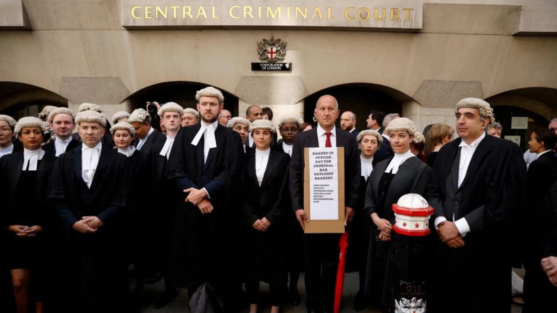 British criminal trial lawyers vote to go on indefinite strike in September