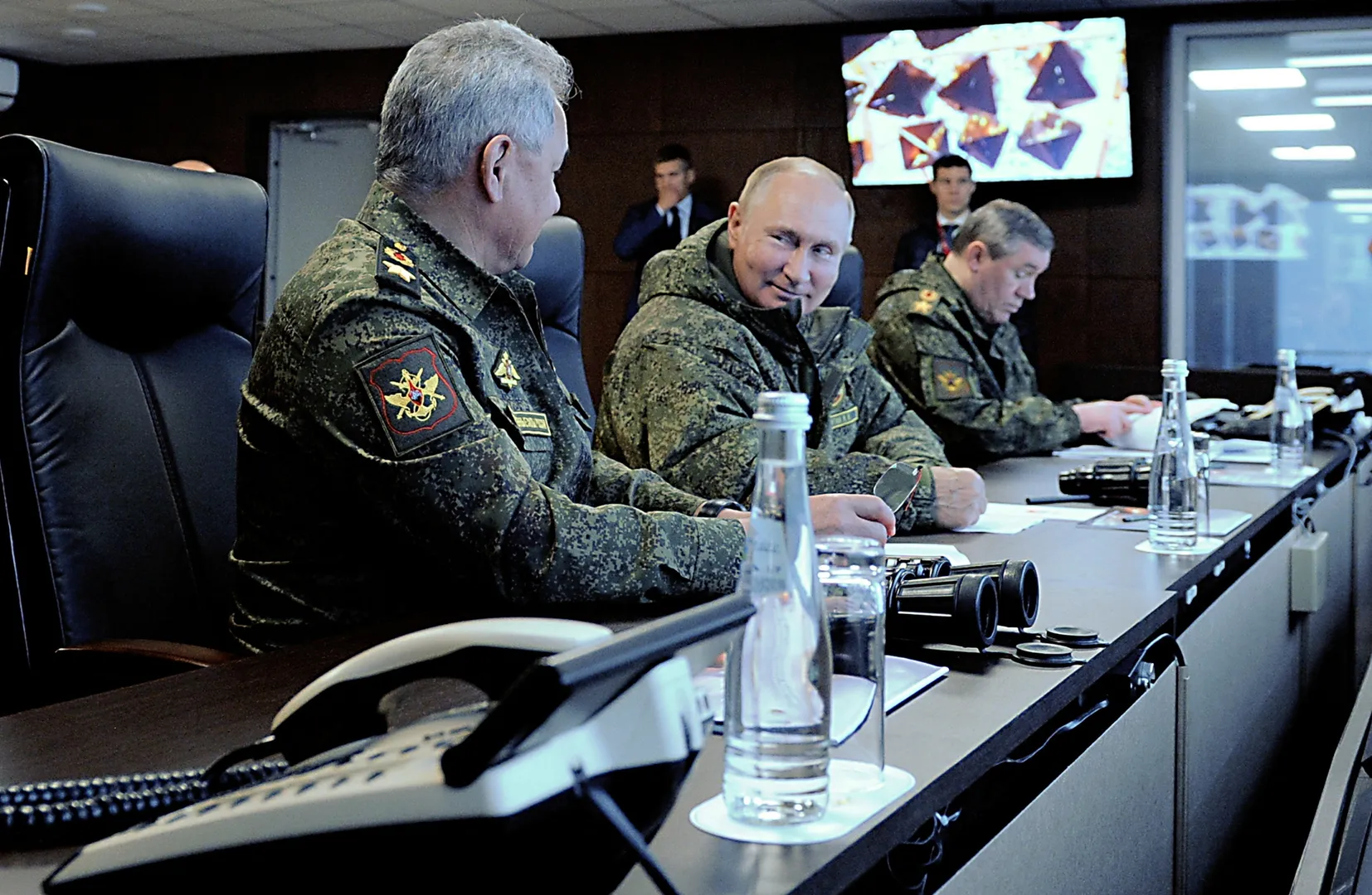Russian President Vladimir Putin attends military exercises with Chinese forces