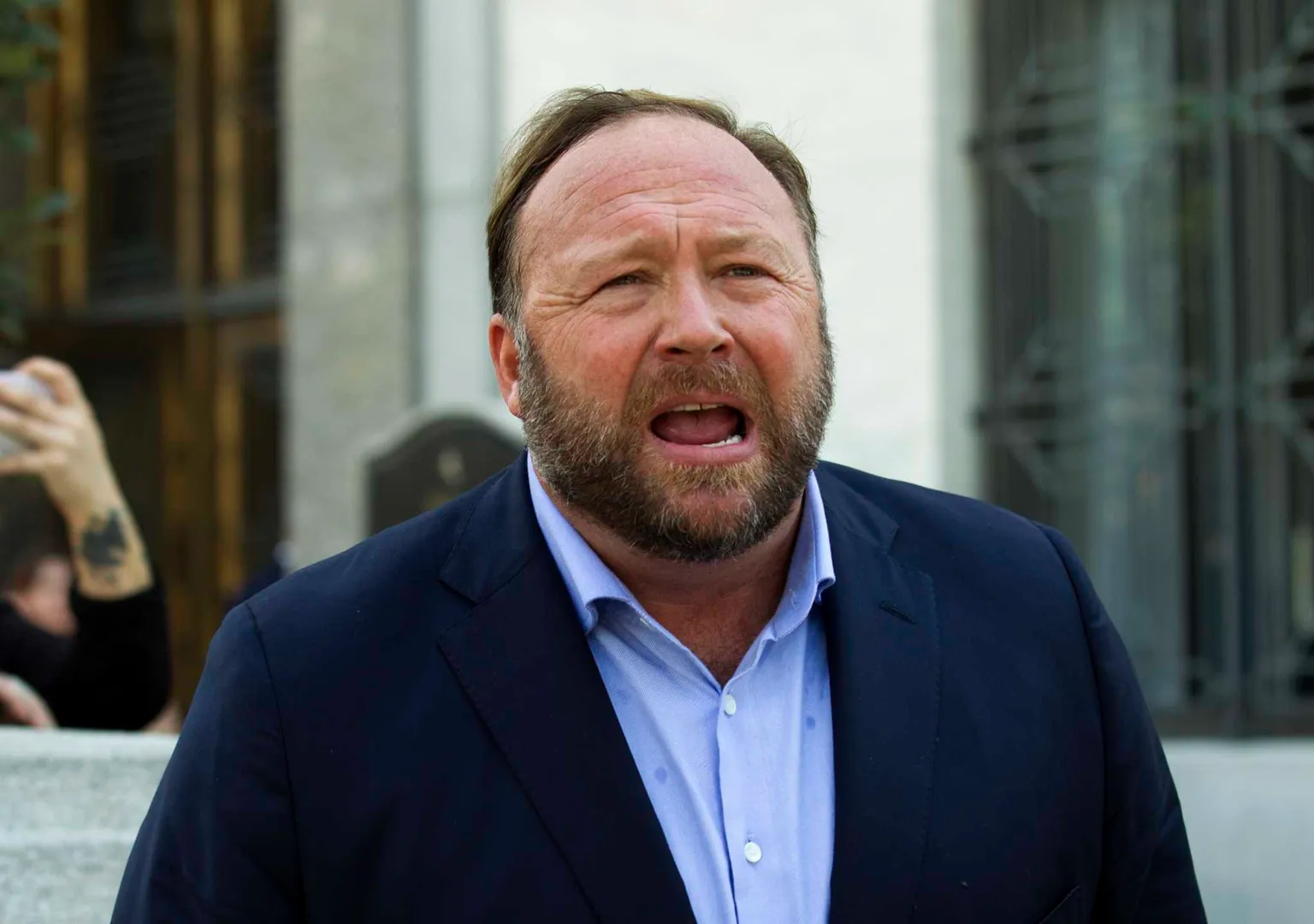 Infowars owner Alex Jones ordered to pay Sandy Hook victims' families $965 mn over hoax claims