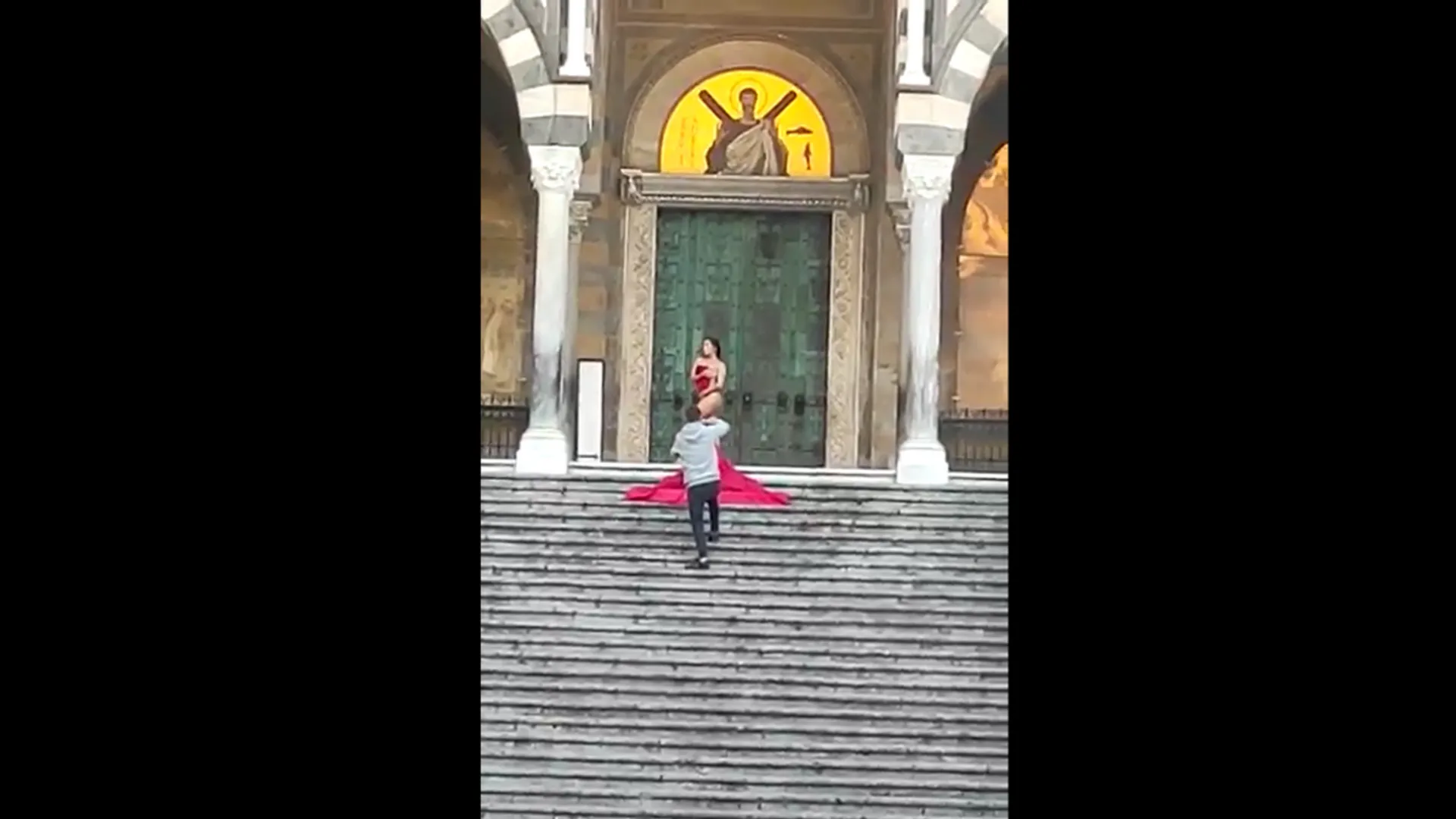 Italy: Touristâs semi-nude photoshoot on the steps of cathedral sparks outrage, says report