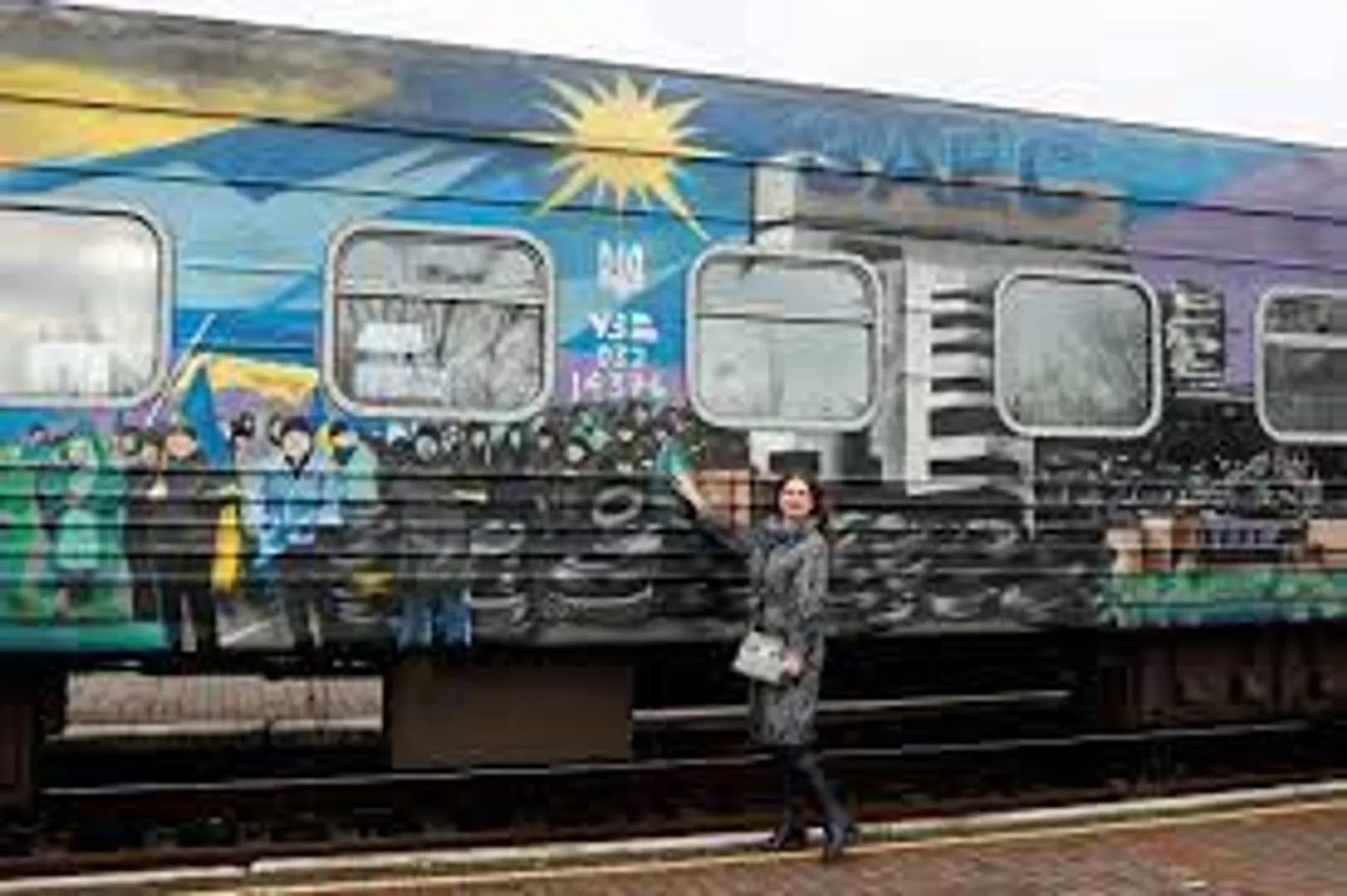 Ukraine rolls first passenger train into newly freed Kherson