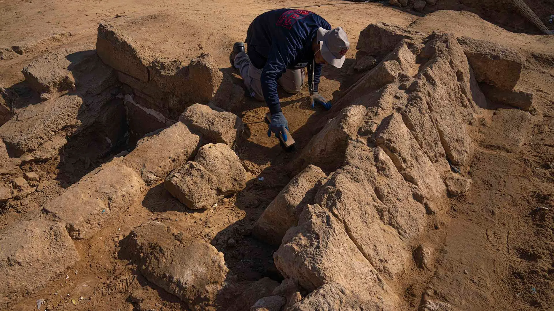 Gaza: Over 60 second century tombs discovered, workers sift through soil to excavate
