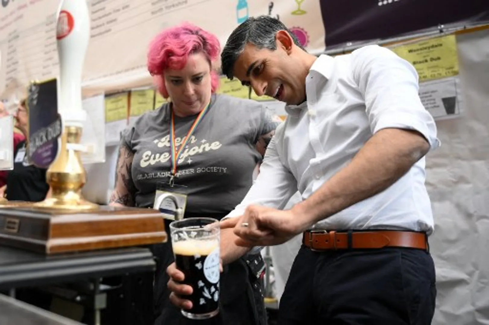 'Oh the irony you're raising alcohol duty...': UK PM Sunak heckled while pouring a pint at beer festival