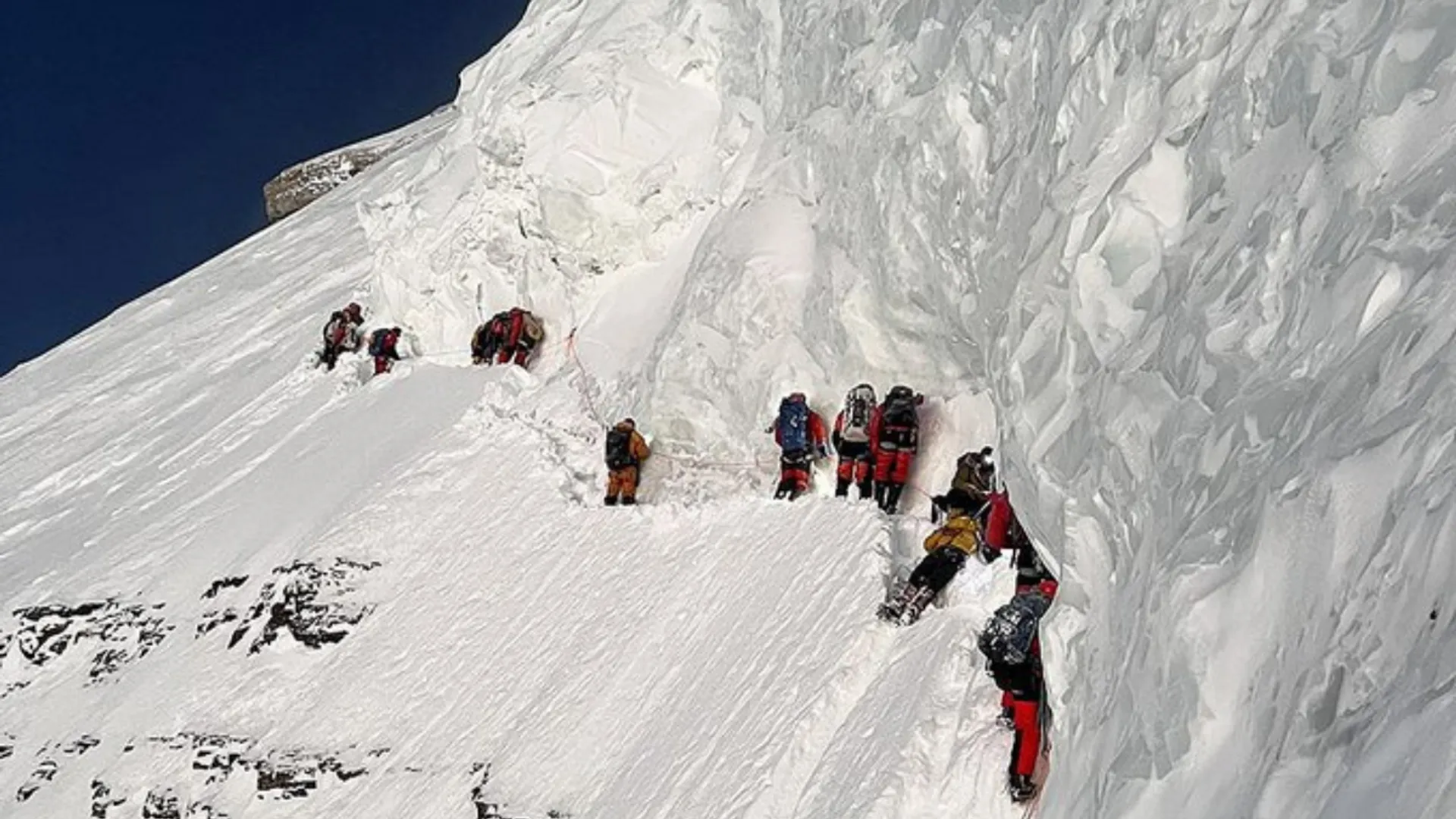 Record-breaking mountaineer refutes reports of climbing over porter's dead body to scale K2