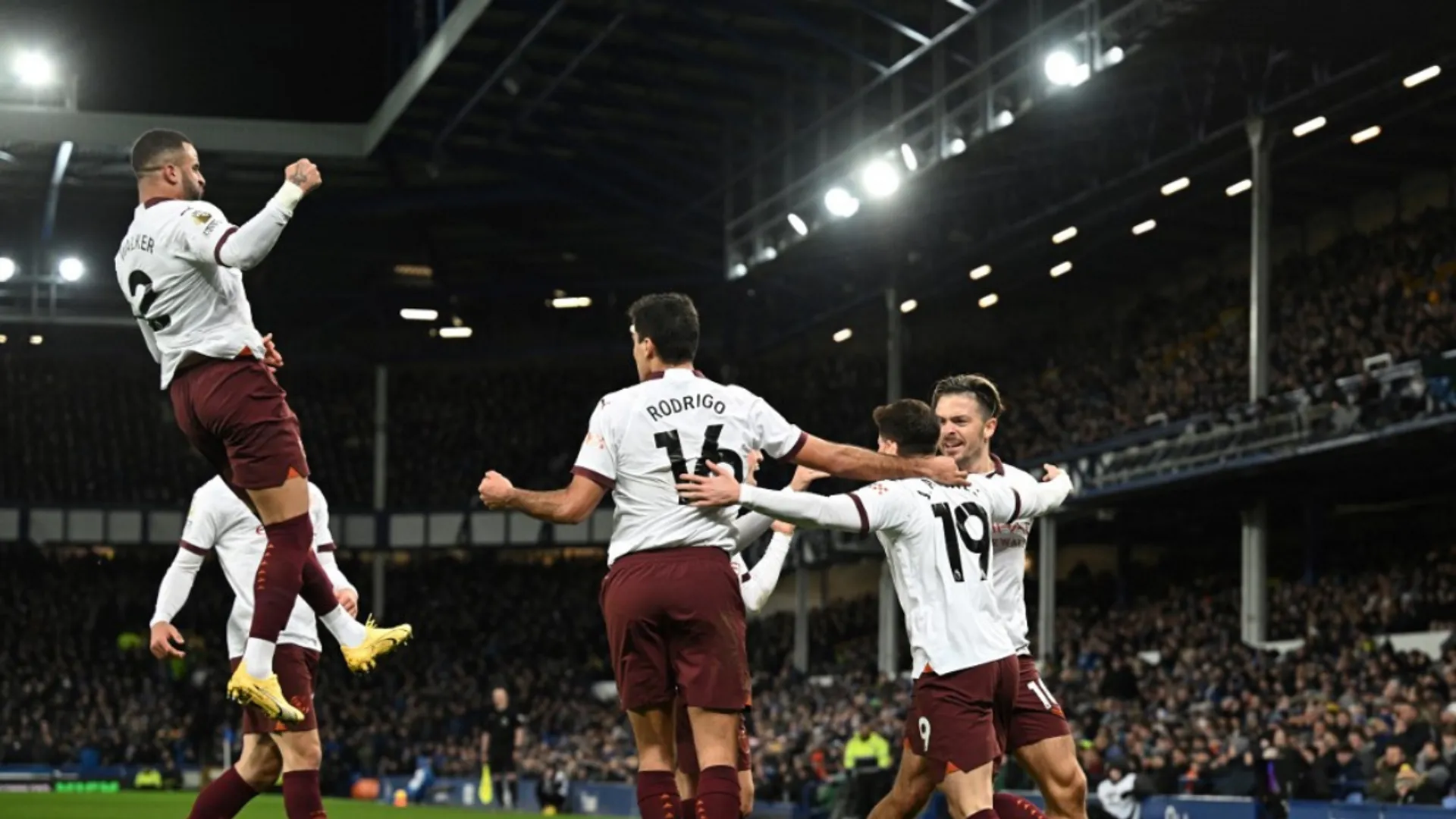 Manchester City return to PL title race with comeback win over Everton