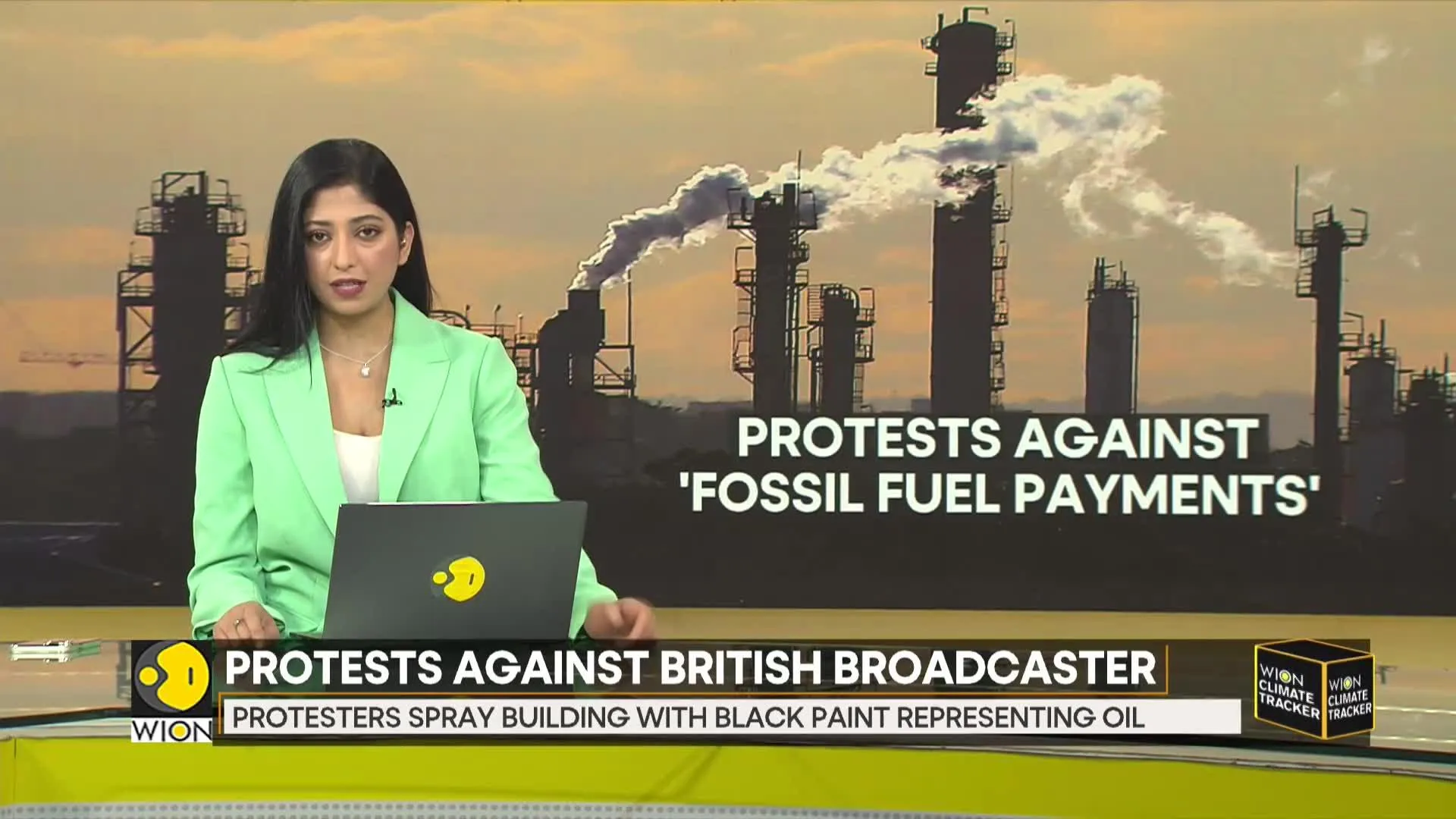 UK: Climate activists protest outside GB News, spray building with black paint representing oil