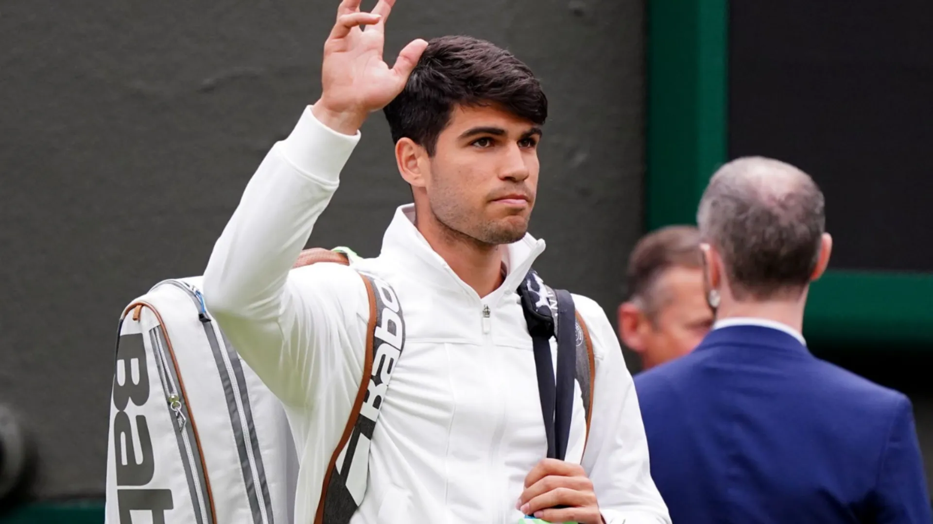 Wimbledon 2024: Defending champion Carlos Alcaraz survives Frances Tiafoe scare to reach fourth round