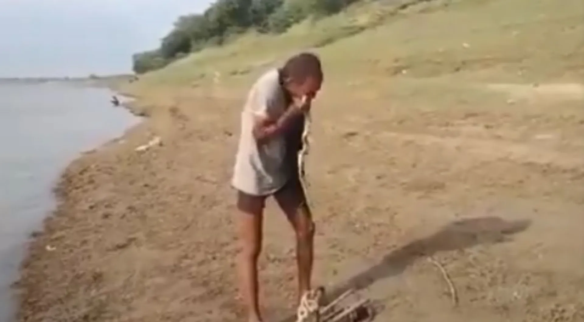Video: UP man catches snake from river, eats it alive; then walks off