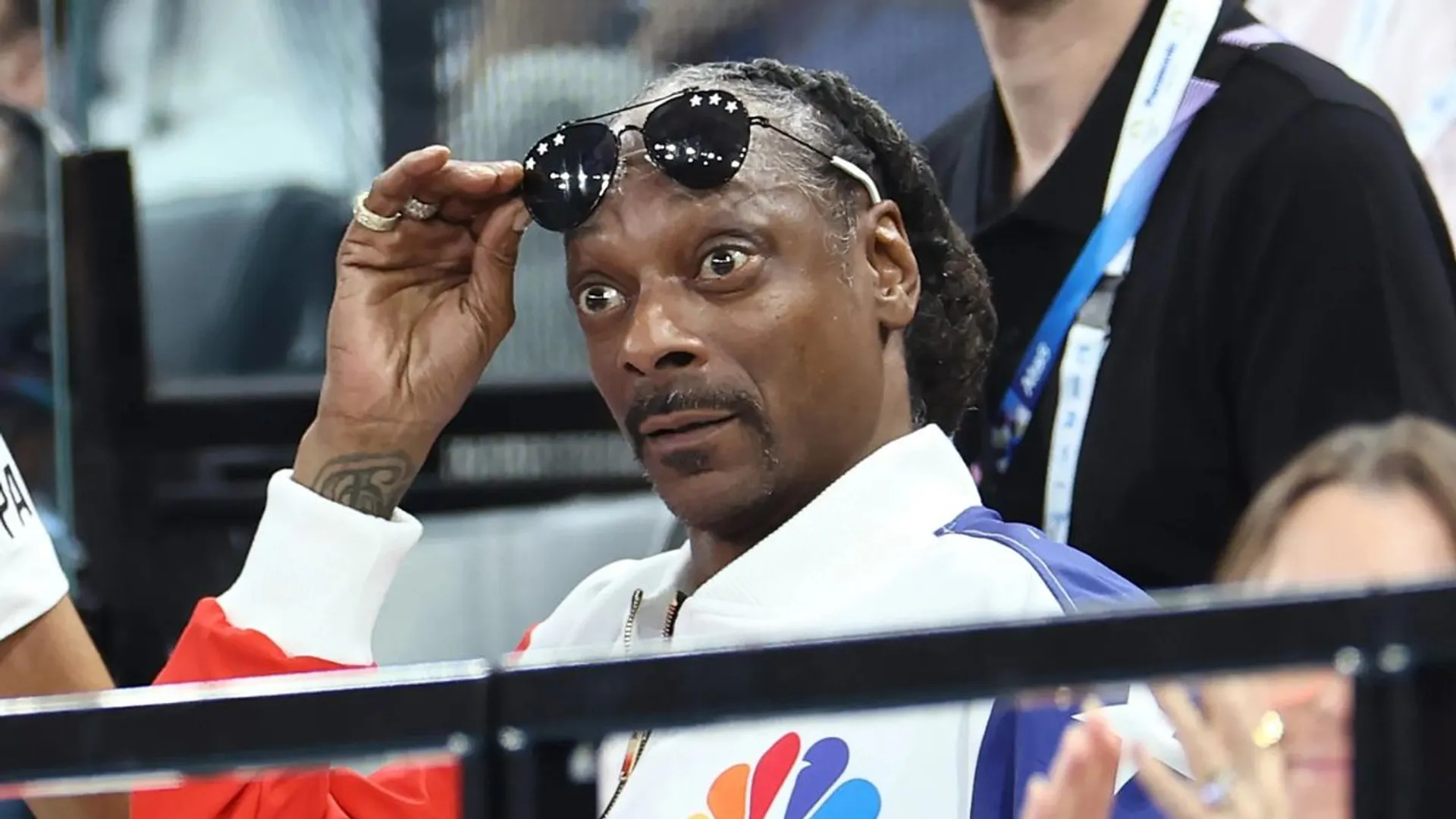 Snoop Dogg impresses fans with custom tees at Olympics 2024