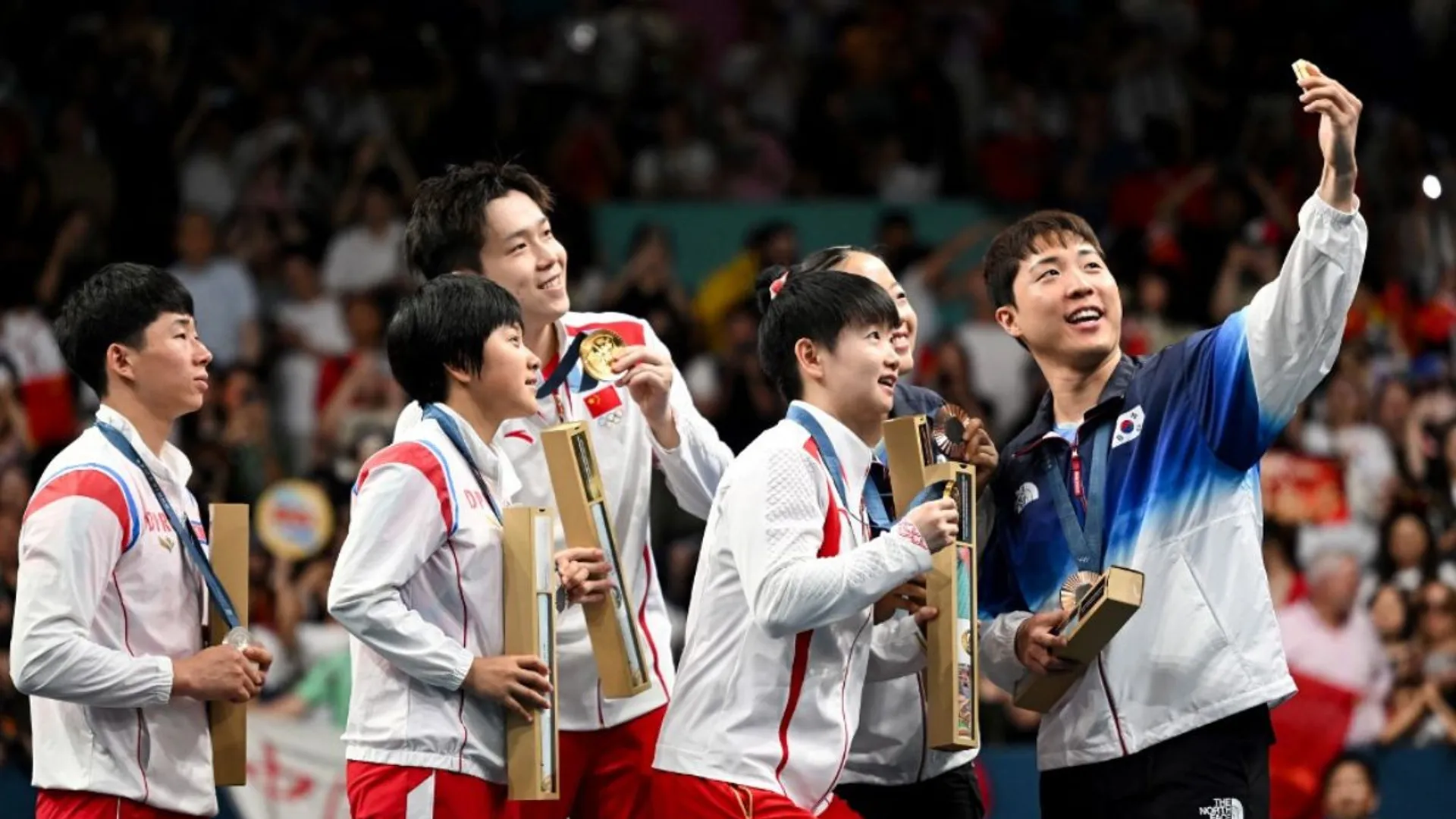 North Korea to punish Table Tennis players for 'smiling' with rivals on Olympic podium
