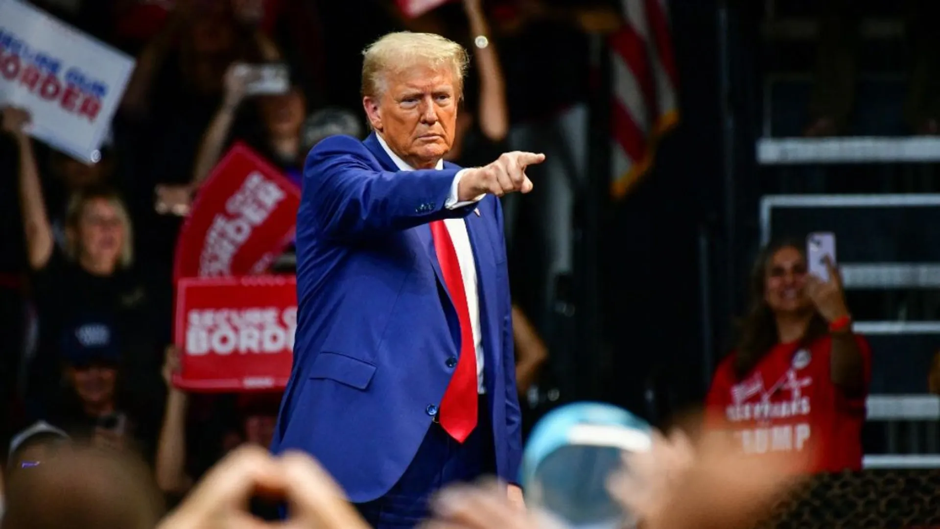 Trump pauses mid-rally to compliment a female supporter, remarks about 'politically correct culture'