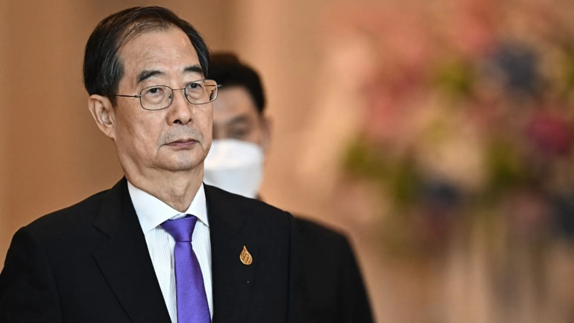 Who is Han Duck-soo, South Korea's acting President that replaced Yoon?