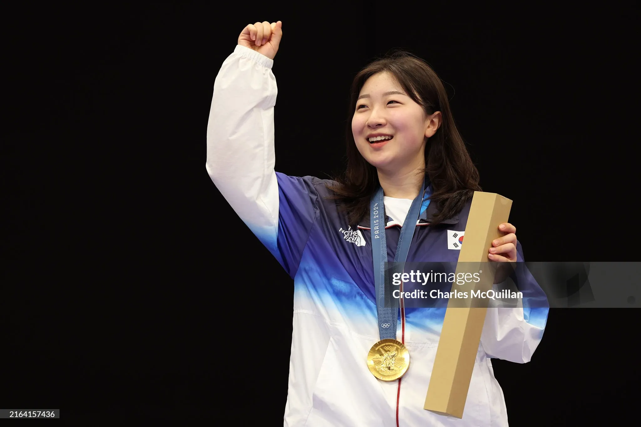 Ban, 16, who is still who's still studying at high school, beats Huang Yuting of China in a shoot-off to win the Gold in the Women's 10m Air Rifle final and equals the Olympic record set by Yang Qian in Tokyo. - sportzpoint.com