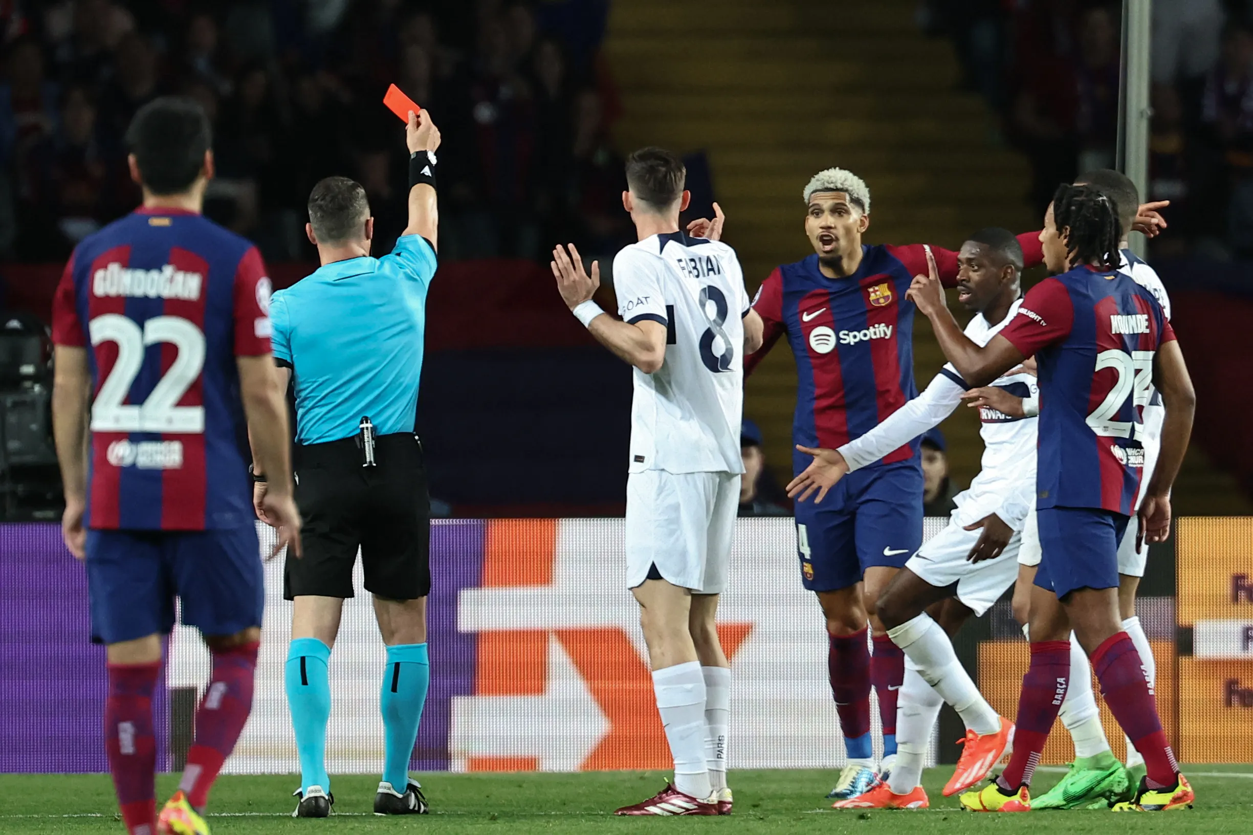 Ronald Araujo received a direct red card for a foul on Barcola in the Barcelona vs PSG UCL 2023-24 QF second leg | sportzpoint.com 