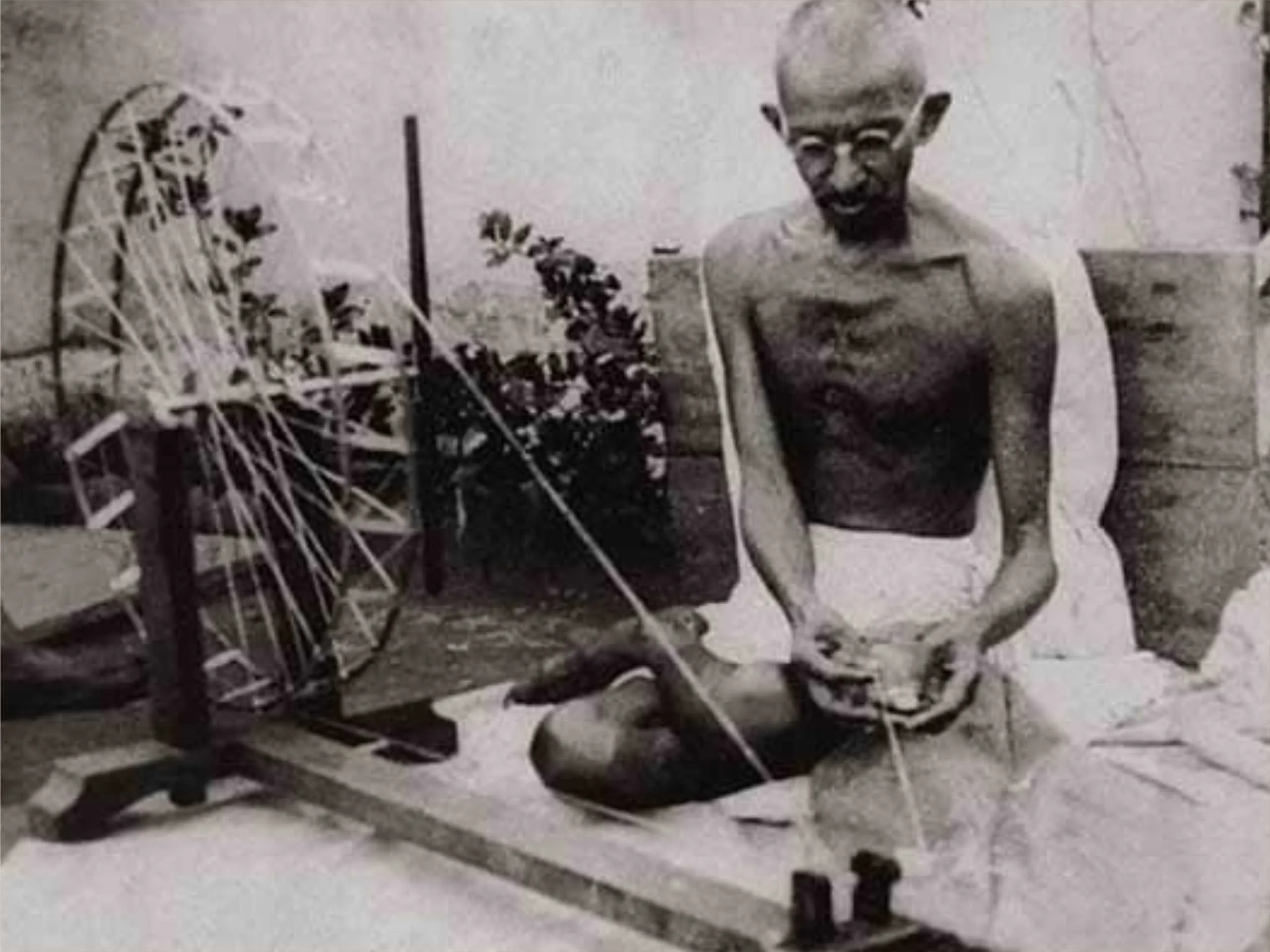 Gandhi ji with charkha