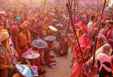 Holi 2024: नंदगांव में मनाई जाती है लट्ठमार होली, जानिए कुछ अहम बातें |  Moneycontrol Hindi