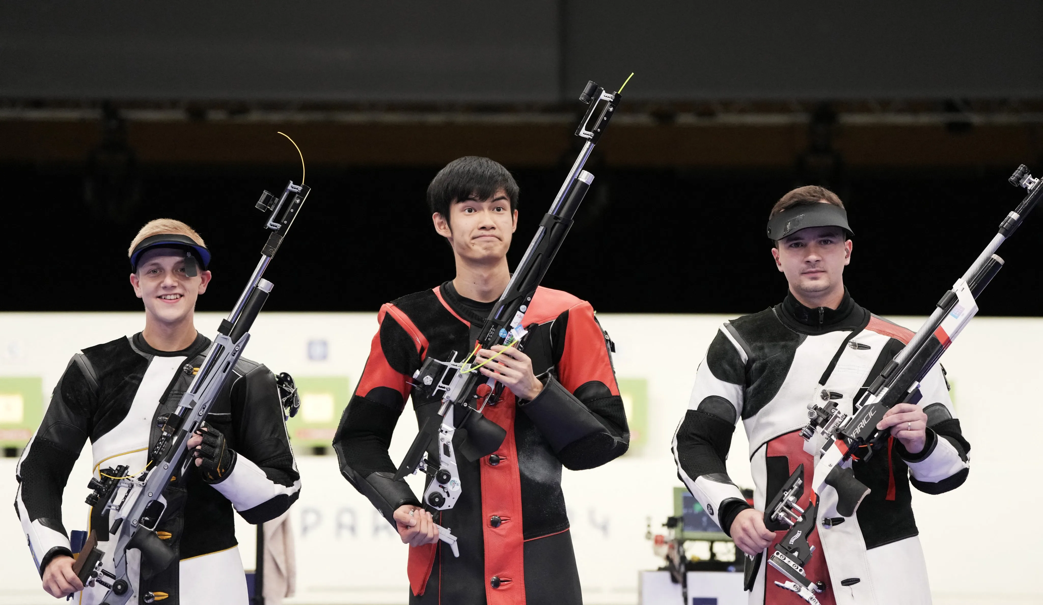 Sheng Lihao wins the Men's 10m Rifle event with an Olympic record of 252.2.- sportzpoint.com