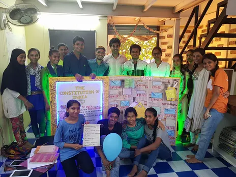 Nawneet Ranjan with students at Dharavi Diary