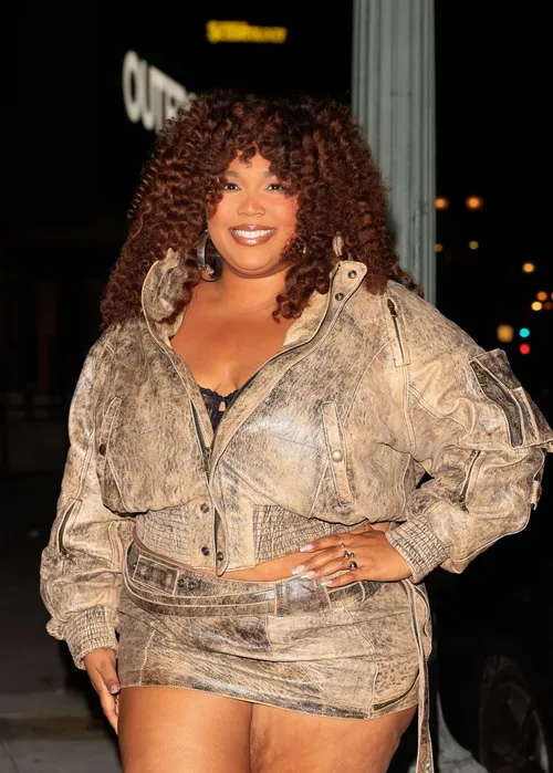 lizzo shoulder length hair with fringe