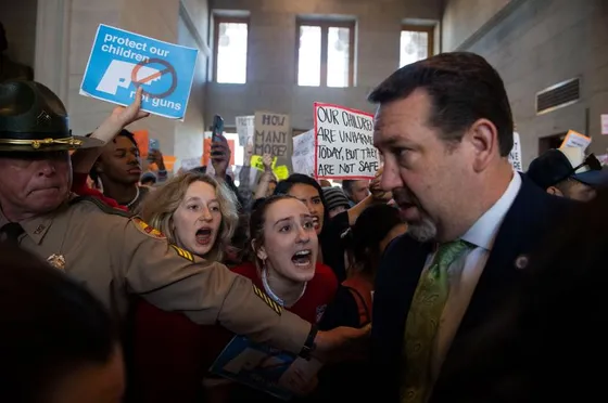o something,” with other protesters as Rep. Jeremy Faison, R-Cosby, Chairman of the House Republican Caucus, walks towards the House Chamber doors during at the State Capitol Building in Nashville .