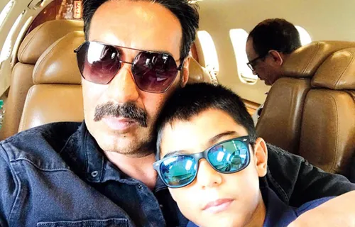 TROLLS SLAM AJAY DEVGN FOR SMOKING IN FRONT OF HIS SON