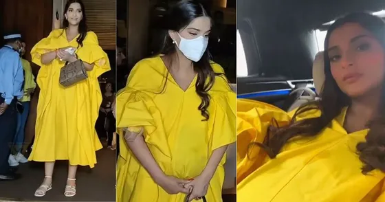 सोनम कपूर  डिनर के लिए बाहर निकलते हुए पीले रंग की ड्रेस में अपना बेबी बंप फ्लॉन्ट करती नजर आईं.