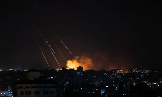Israeli Airstrikes Wreak Havoc in Gaza & Lebanon, Killing 13