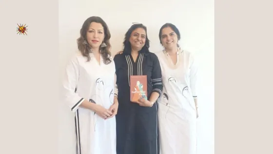Dr Aditi Govitrikar and author Reeta Ramamurthy Gupta sport Pret label 'House of Maana's tribute to Savitribai Phule book