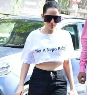 Uorfi Javed once again makes a statement with "Not A Nepo Baby" tshirt as she goes to meet Maharashtra State Commission Women Head