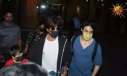 A Fan Forcefully Holds Shah Rukh Khan's Hand; Watch How Aryan Khan reacted: