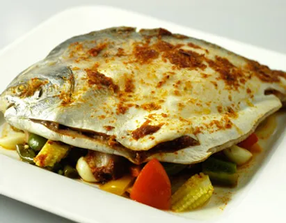 Oven Baked Fish With Spicy Harissa