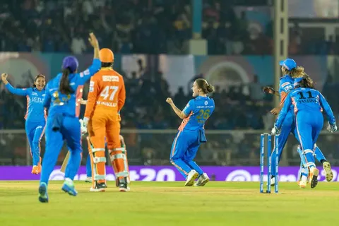 Mumbai Indians Women Qualify for Playoffs with Convincing Win over Gujarat Gladiators Women