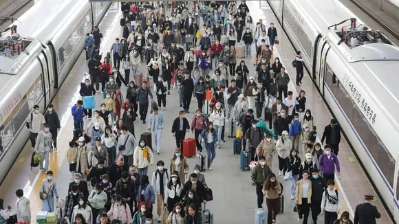 China's May Day Travel Surge: Rail and Road Trips Soar Amid Economic Challenges