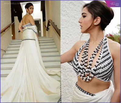Sara Ali Khan Outfit : flaunting herself in an off-white chamois satin..